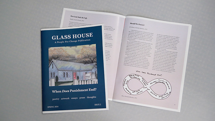 A publication called The Glass House is shown with its cover and also open on top of a desk.