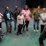 Dr. Rebecca Monteleone, an assistant professor in the Disability Studies Program and the UToledo facilitator of the Open Spot Partnership, runs through lines with members of the theater group.