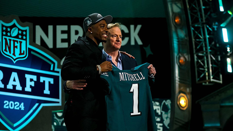 Quinyon Mitchell poses with NFL Commissioner Roger Goodell following his selection as the 22nd player chosen in the 2024 NFL Draft. Mitchell is the first Rocket to be taken in the first round of the draft in 31 years.