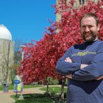 Physics Ph.D. candidate Sam Federman, posing outside on Main Campus, is lead author of a recent research article in the Astrophysical Journal.