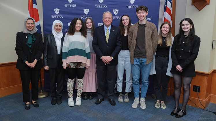 UToledo President Gregory Postel, center, poses with students who were either recently nominated for or have received nationally competitive scholarships and fellowships at the Office of Competitive Fellowships’ Awards Reception and Breakfast in late April.