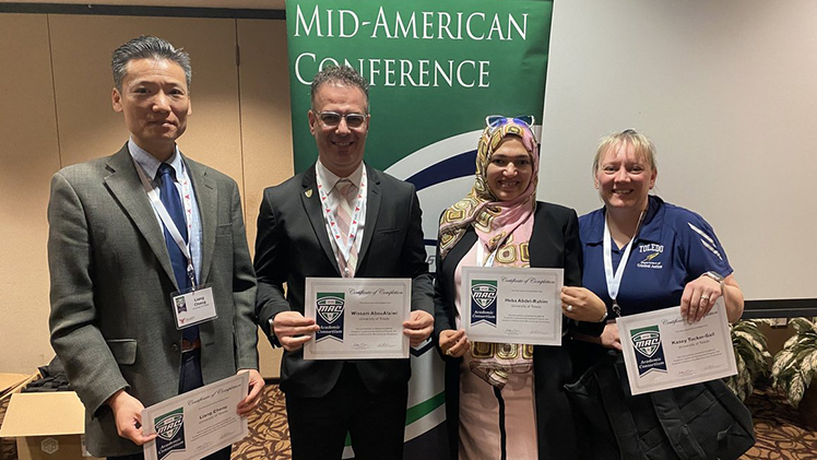 UToledo faculty, from left, Dr. Liang Cheng, Dr. Wissam AbouAlaiwi, Dr. Heba Abdel-Rahim and Dr. Kasey Tucker-Gail, pose in a group photo with their MAC Academic Leadership Development Program completion certificates.