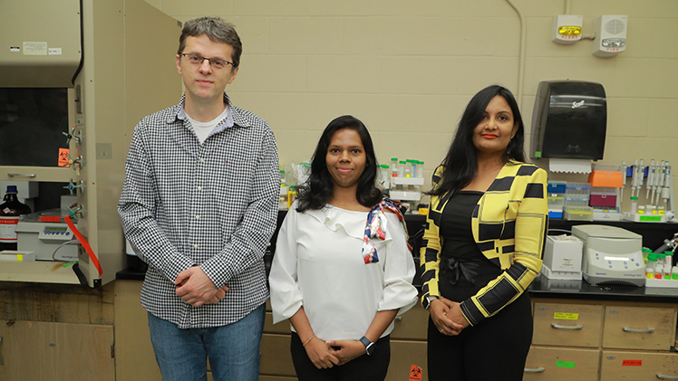 Dr. Dragan Isailovic, from left, professor in UToledo’s Department of Chemistry and Biochemistry, is joined by doctoral candidate Sanduni Premathilaka and postdoctoral researcher Sharmila Thenuwara as co-authors on a recent research article in the International Society of Microbial Ecology Journal.