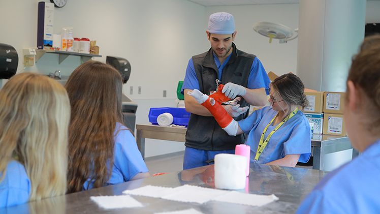 A photo of students and an instructor at UToledo's CampMed.