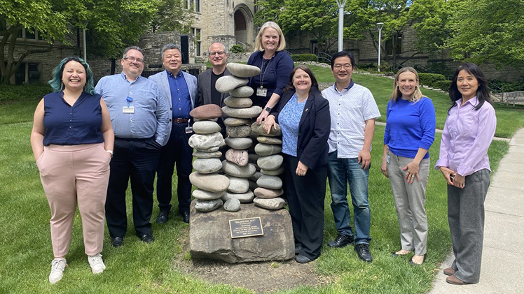 From left, Danielle Santos, a doctoral student and research assistant in the Herb Innovation Center; Dr. James Burkett, an assistant professor of neuroscience in the UToledo College of Medicine and Life Sciences; Dr. Jiayong Lui, an associate professor in the College of Medicine and Life Sciences; Dr. Robert Langendorfer, an assistant lecturer in the College of Engineering; Dr. Alana Malik, university assessment director; Dr. Jeanne Kusina, director of the Center for Excellence in Teaching and Learning; Dr. Qun Wang, an assistant professor in the College of Arts and Letters; Dr. Lindsay Riegle, an adjunct faculty member in the College of Health and Human Services; and Dr. Amy Bian, an associate lecturer and program director of Mechanical Engineering Technology in the College of Engineering.