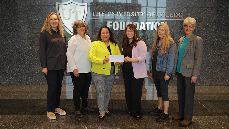 From left, Cindy Miller, senior director of corporate and foundation engagement development at UToledo Foundation; Mickey Radkin and Nina Corder, both past presidents of American Association for University Women; Danielle Lutman, associate director for the Catharine S. Eberly Center; and Ann Strickler and Jeanie Lee, both AAUW members.