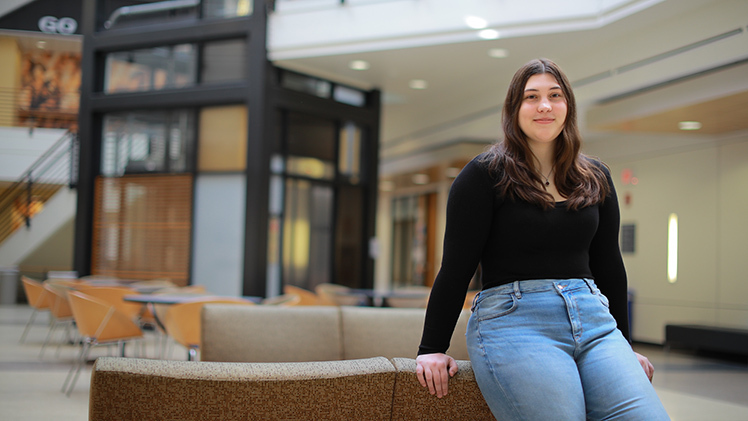 Audrey Harrigan, an Asian studies sophomore, poses for an indoors feature portrait.