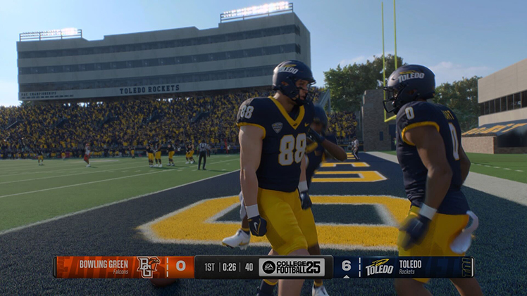 Screenshot of two Toledo football players celebrating a touchdown in the new EA Sports College Football 25.