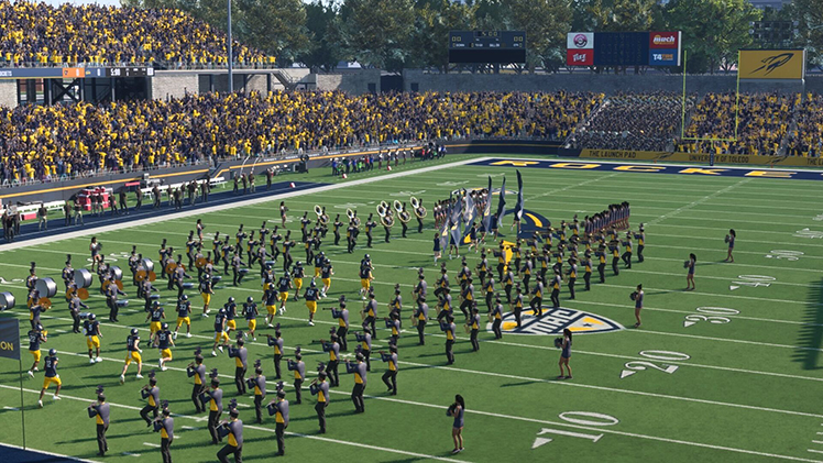 Screenshot of Toledo football players running onto the the Glass Bowl Stadium field as fans cheer in the new EA Sports College Football 25.