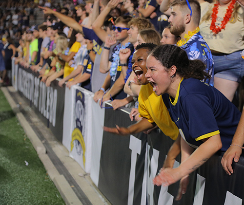 UToledo students scream for the Rockets during the 2024 season opener at Glass Bowl Stadium.