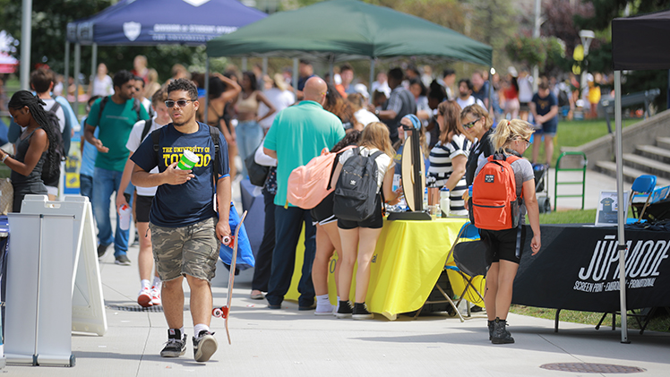 Photo of a crowd of students and participants at a UToledo Student Involvement Fair.