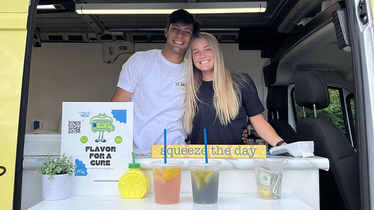 Anthony Rammuny, a pre-business sophomore, works a shift in his lemonade truck with his girlfriend Kaylee Szymanski, a radiation therapy sophomore.