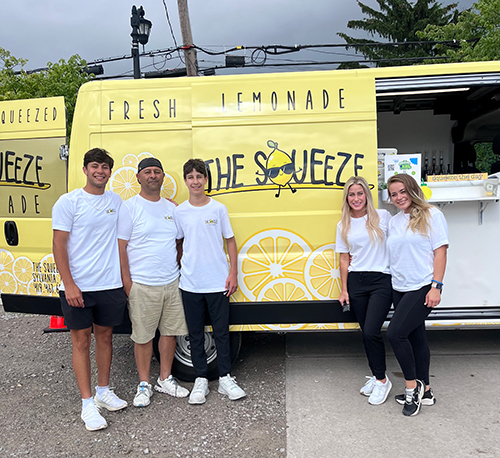 Anthony Rammuny, a pre-business sophomore, credits his success with his lemonade truck, the Squeeze, to the support of his family. From left are Anthony Rammuny, his father Omar, his brother Zaine, his mother Janna and his sister Riley.