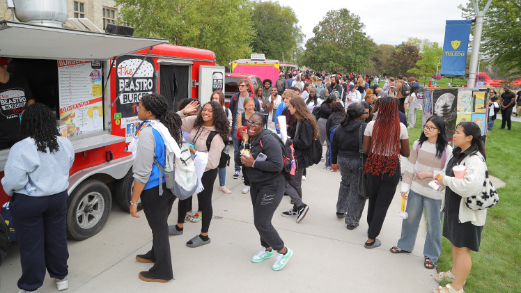 A photo of Tuesday’s annual Eat the Streets event, which brought food trucks and inflatables to Centennial Mall as part of a weeklong Homecoming celebration leading up to Saturday’s game.