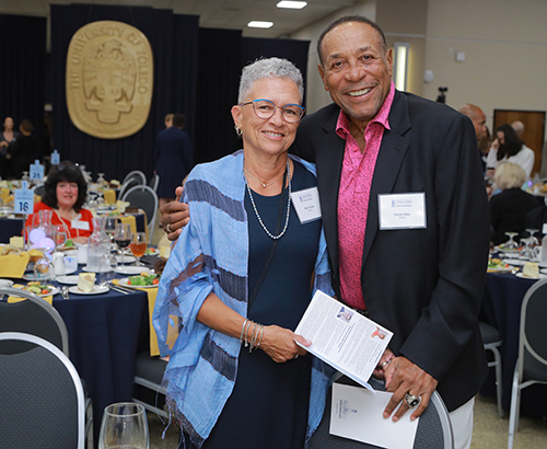 Posing for a photo at the Homecoming Gala is former UToledo football great Chuck Ealey, a College Football Hall of Fame inductee who never lost a never lost a game in his three seasons as the Rockets’ starting quarterback, and his wife, Sherri Ealey.