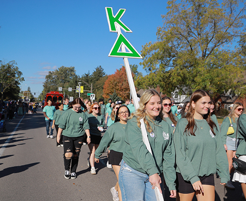 Members of the KA sorority march in the 2024 Edward C. and Helen G. Schmakel Homecoming Parade.