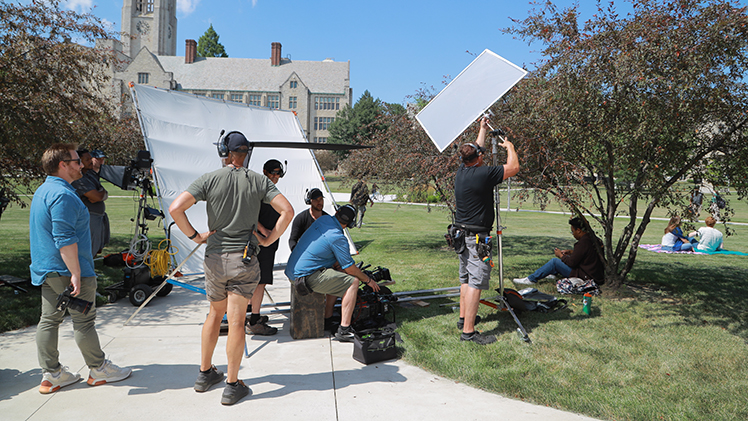 Behind-the-scenes photo of an on-campus commercial shoot in early summer for UToledo's new branding, The Power To Do. 