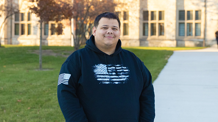 Feature portrait of Joshua Solis, 30, who is pursuing his master's in social work.