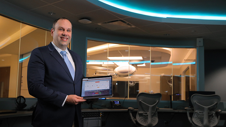 Portrait of Dr. Scott Pappada, an associate professor in the Department of Anesthesiology, who is spearheading development of an AI-driven assessment platform to ensure military healthcare professionals are mission-ready.