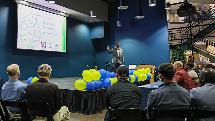 Dr. Sridhar Viamajala, a professor in the Department of Bioengineering and founder and CEO of Avani Enterprizes, a high-yield recycling process, pitches his technology to a panel of judges Thursday evening at the UToledo Business Incubator’s Tech419 Pitch Competition.