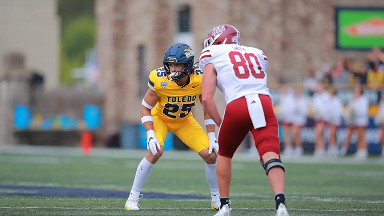 In-game football photo of Rocket senior Maxen Hook, a safety from New Palestine, Indiana, who earned first-team All-MAC honors for the third consecutive season.