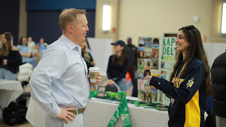 UToledo Interim President Matt Schroeder speaks with Joelle Obri, a junior biology student, from the Kappa Delta sorority table during Tuesday’s annual Spring Campus Involvement Fair in Thompson Student Union Auditorium and the Ingman Room.