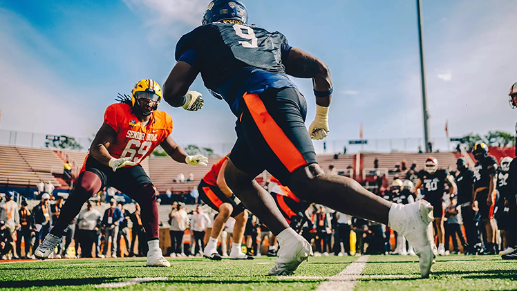 Former Toledo defensive tackle Darius Alexander goes against an offensive lineman during a recent practice for the Senior Bowl game at Hancock Whitney Stadium in Mobile, Ala. on Saturday.