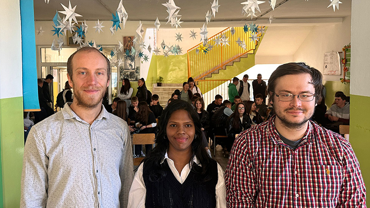 Tyler Brau, right, a Ph.D. candidate in physics, and Dr. Sanduni Premathilaka, who recently earned her Ph.D. in chemistry, traveled to Serbia in October to collaborate with researchers including Dr. Nikola Ilic (left) on the development of renewable energy solutions and water sustainability initiatives.