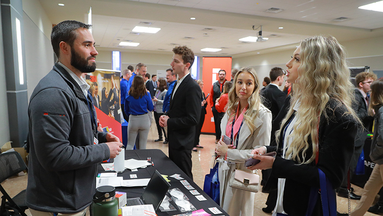 Students participate in a career fair during the University of Toledo Invitational Sales Competition in 2023.