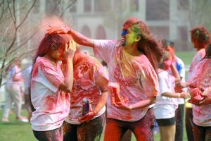  Revelers throw brightly colored powder during Holi Toledo.