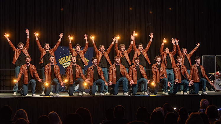 Kappa Delta Rho fraternity performs during Saturday’s Songfest 2025 Battle of the Bands at Savage Arena. The group won first place in the men’s category for their “Golden Nights” performance.