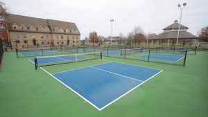 Green and blue pickleball courts on Main Campus.