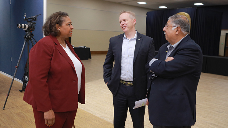 Photo of TPS Board President Bob Vasquez, right, UToledo Interim President Matt Schroeder, center, and Owens Community College President Dionne Somerville at the announcement.