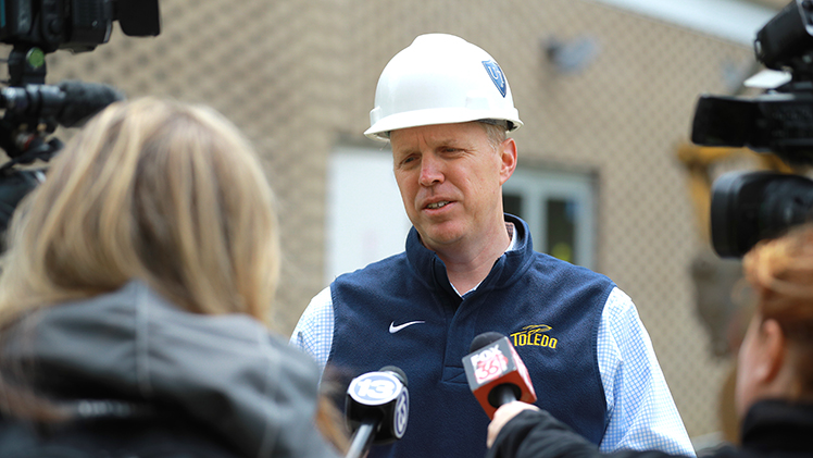 Interim President Matt Schroeder speaks to local media about the demolition of Sullivan Hall and, later this summer, Academic House and International House, as part of the University’s Campus Master Plan.