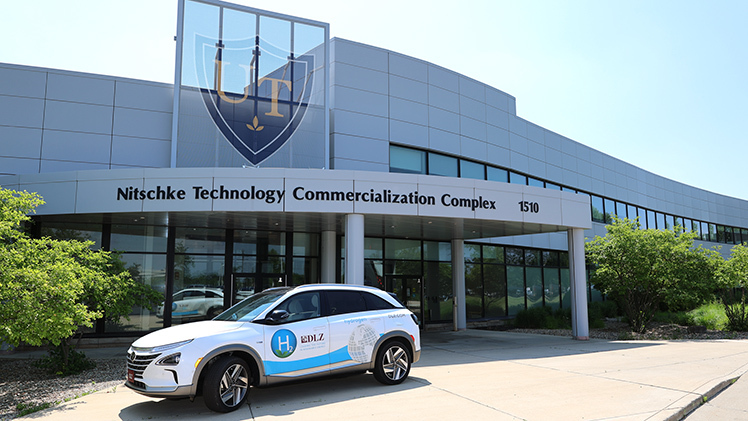 Representatives of DLZ, an engineering consulting firm based in Toledo, described their hydrogen-related projects during a panel discussion on Thursday. One example is a hydrogen-fueled vehicle that was parked outside the Brady Center.