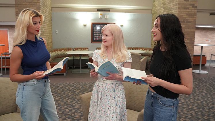 Undergraduates Lauren DeRaedt, left, and Sabina Mikery-Munoz, right, discuss their upcoming constitutional studies symposium with Dr. Deborah O’Malley, an assistant professor in the Institute of American Constitutional Thought and Leadership. DeRaedt and Mikery-Munoz are both Civitas Fellows pursuing minors in Constitutional Studies.