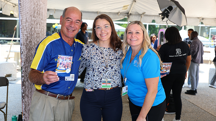 From left, Dan Barbee, chief executive officer of UTMC, poses for a photo with Bree Meinzer, UTMC managed care manager, and Holly Smith, UTMC ambulatory care pharmacy director.