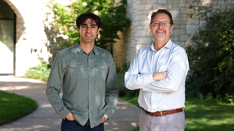 : Harshil Kothari, left, a doctoral student studying physics with a concentration in astrophysics, stands next to Dr. Michael Cushing, his advisor and a professor in the Department of Physics and Astronomy.
