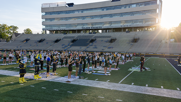 The University of Toledo's Panhellenic Council held yoga in the Glass Bowl on Wednesday night, inviting sorority members and other students wanting to enjoy yoga.