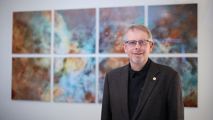 Portrait of Dr. Tom Megeath, who specializes in protostars as a Distinguished University Professor in the Department of Physics and Astronomy.