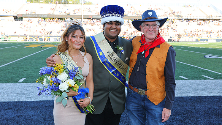the Homecoming 2025 King and Queen, Yash Thakare and Benisha Gurung, were recognized by President Holloway.
