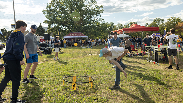 Students play a game as part of the pre-game festivities.