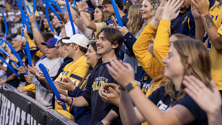 UToledo students scream for the Rockets during a game at the Glass Bowl.