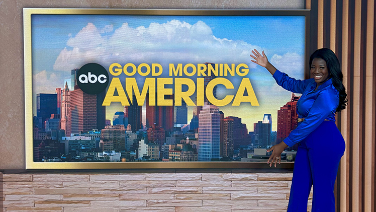 Photo of Dr. Alexandra-Elise Dakaud Patterson, a general surgery resident who also is completing a master’s in cosmetic science and formulation design, who spent the summer with the ABC News medical unit, posing on the set of Good Morning America.
