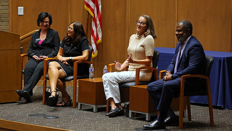 The University of Toledo College of Law Dean Rebecca Zietlow, left, moderated a Tuesday afternoon panel discussion in the McQuade Law Auditorium by three alumni judges: Judge Linda Knepp, center left, Judge Michelle Wagner, center right, and Judge Myron C. Duhart, right.