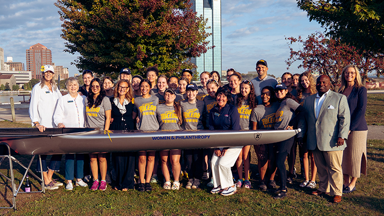 Photo taken of The University of Toledo Women's Rowing program officially dedicating its 8+ boat at a ceremony at the Philip LeBoutillier Jr. Memorial Boathouse in Toledo on Thursday morning.