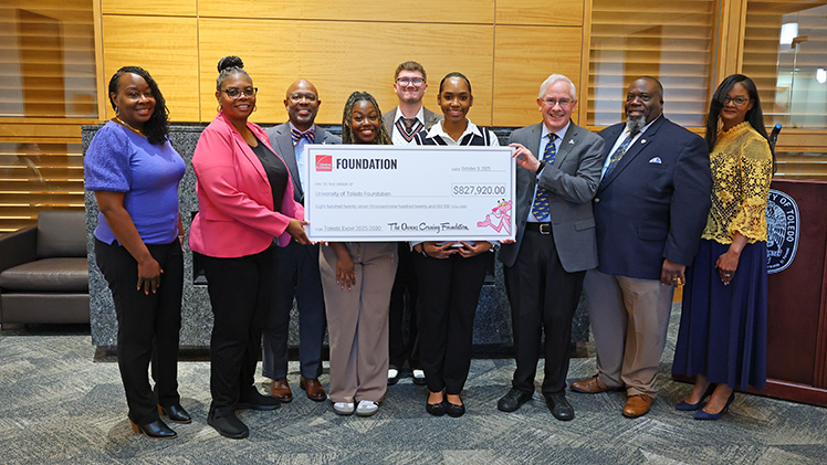 From left, Belinda Wheeler, associate director of Toledo Excel; Lisa Anderson, community affairs leader at Owens Corning; Craig Teamer, Toledo Excel alumnus; Gabrielle Knighten, UToledo freshman and Toledo Excel scholar; Matthew Flick, high school senior and Toledo Excel scholar; Madison Glover, UToledo senior and Toledo Excel scholar; James Holloway, president of UToledo; David Young, director of Toledo Excel; and Shawanna LaVoy, associate director of Toledo Excel.