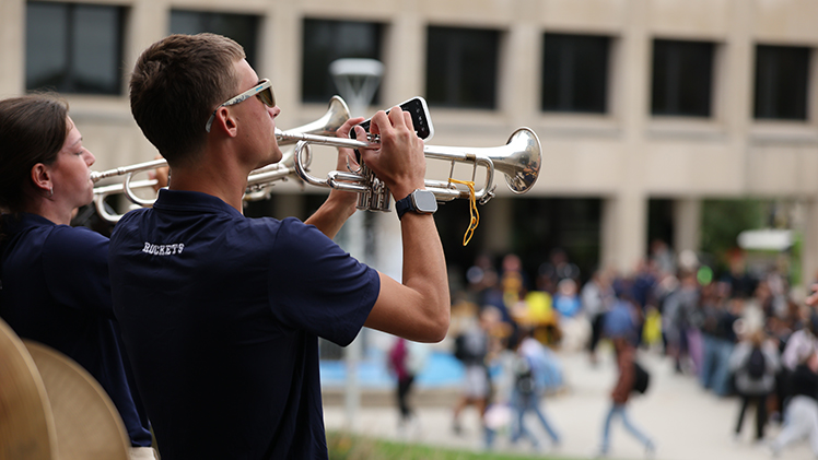 Photo of members of the Rocket Marching Band performing during the President's Backyard Barbecue.