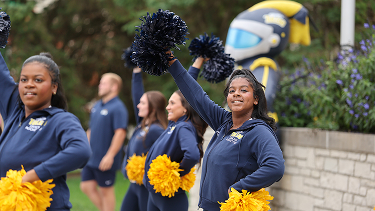 Photo of members of the UToledo Dancing Rockettes performing during the President's Backyard Barbecue.