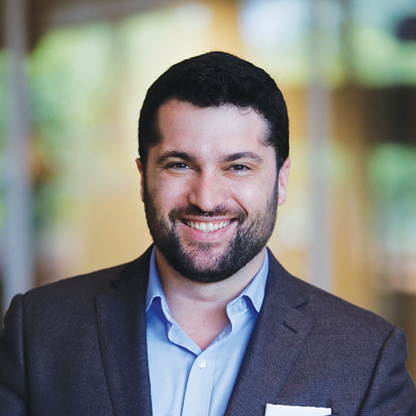Headshot of Alan Rozenshtein, an associate professor of law at the University of Minnesota.